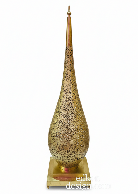 Tall Moroccan brass floor lamp showing the unique pointed finial top.