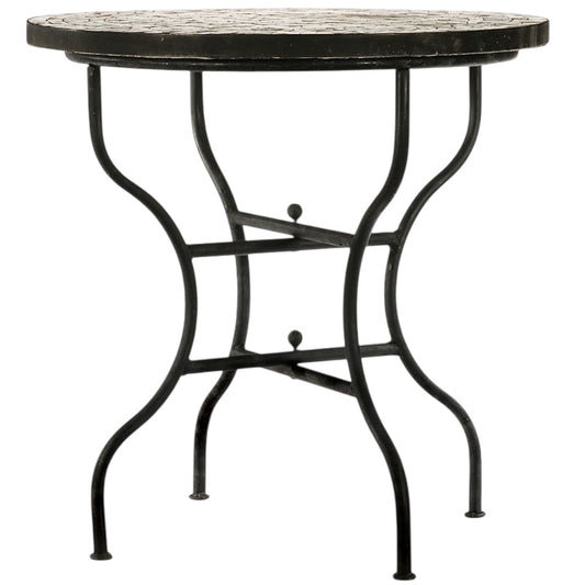 Round boho-style Moroccan mosaic dining table featuring a symmetrical Moorish geometric star pattern.