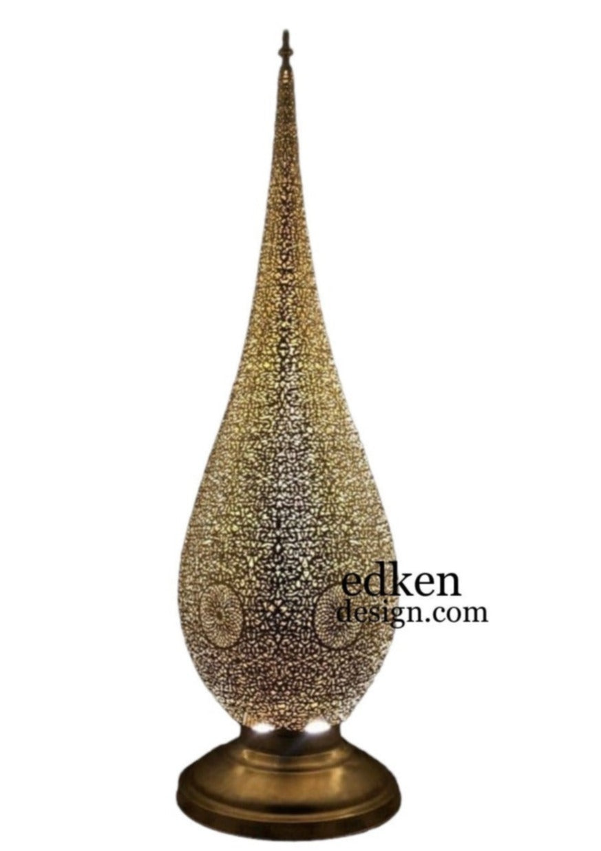 Decorative Moroccan brass lantern table light for luxury interior design.