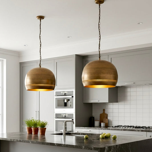 Industrial style brass dome ceiling light with vintage finish and chain.