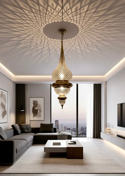Handmade Moroccan brass chandelier illuminating a modern luxury living room with shadow art.