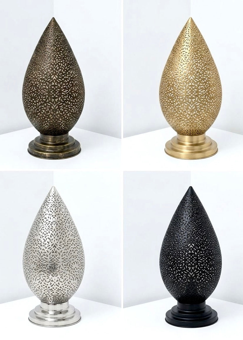 Handcrafted Moroccan teardrop table lamp shown in antique brass, gold, silver, and matte black finishes for custom B2B trade orders.