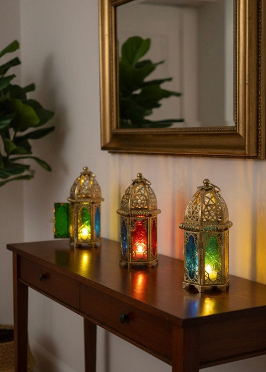 Large handcrafted Moroccan lantern with vintage gold metal and multi-colored stained glass panels.