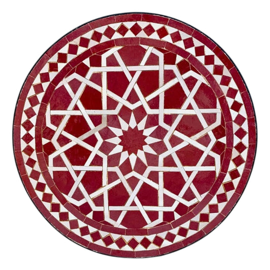 Handmade Moroccan mosaic round table with red and white geometric star design.