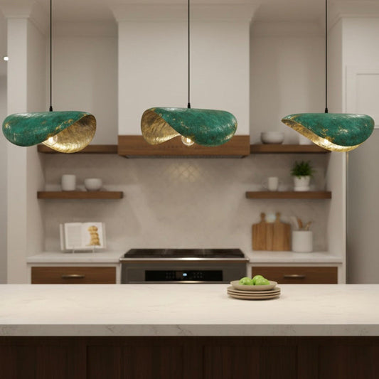 Rustic oxidized brass dome lamp hanging in a modern kitchen or dining area