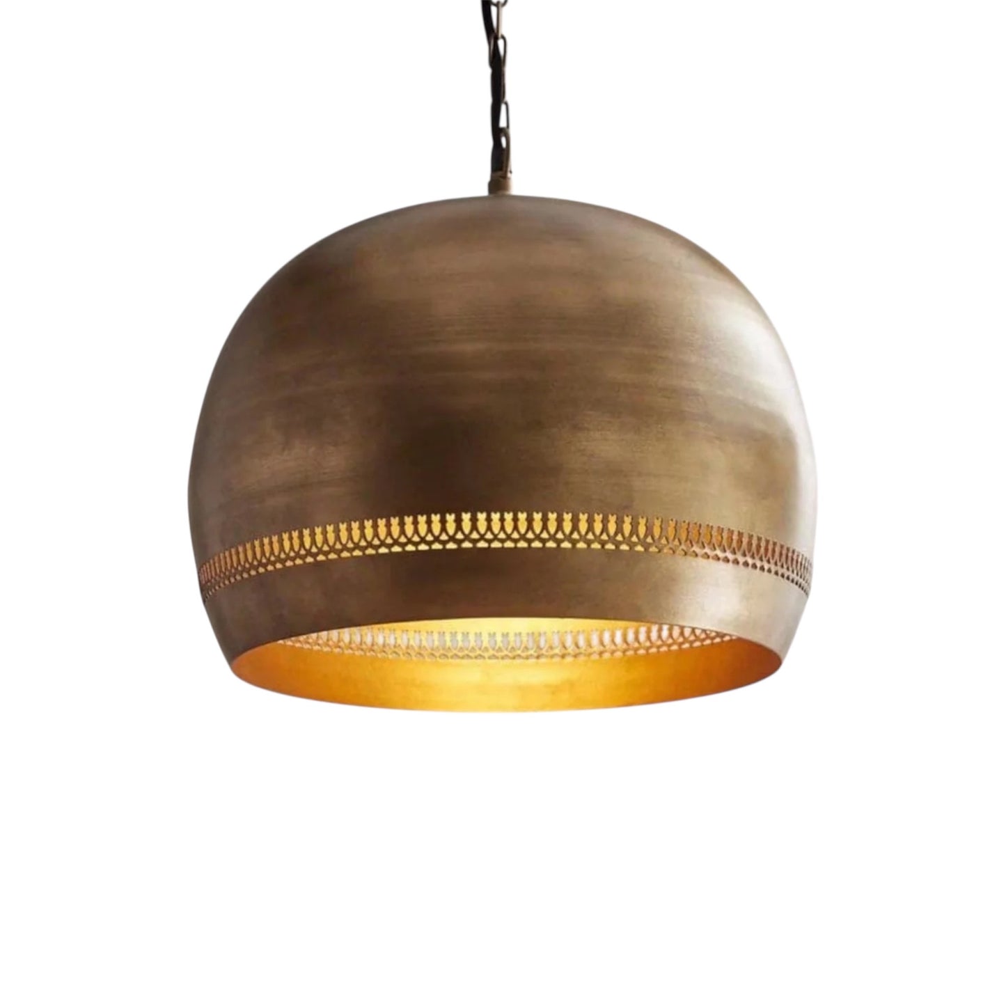 Close-up of hammered brass texture on a Moroccan style dome pendant lamp.