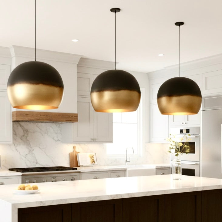 Close-up of a decorative dome light with an antique brass finish, perfect for modern and classic interiors.