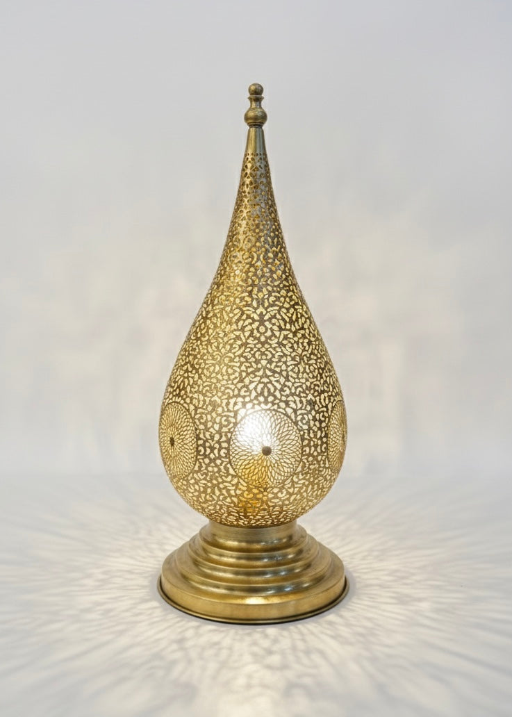 Antique gold finish on a handmade Moroccan brass table lamp showing its high-quality metal texture.