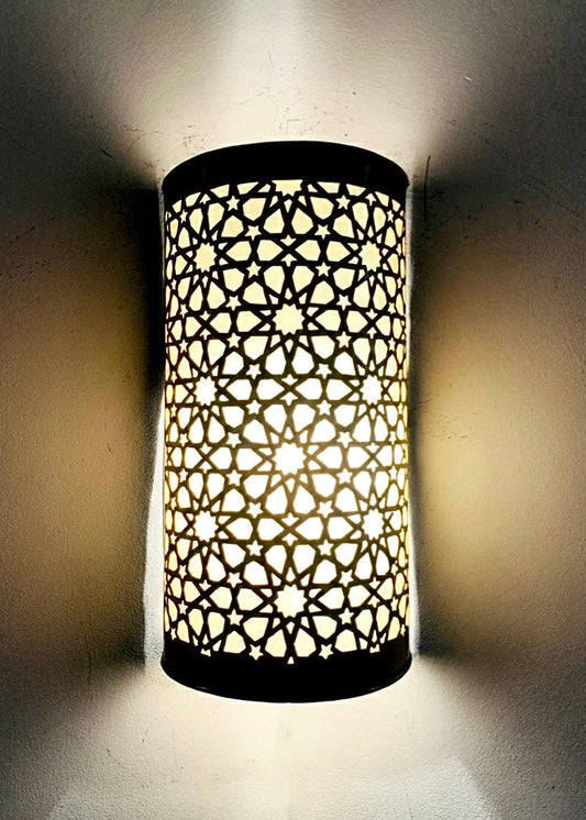 Authentic Moroccan handmade wall sconce in solid brass with fine floral etchings.