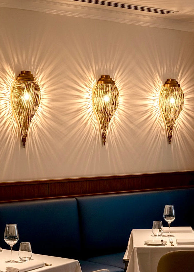 Side view of Moroccan brass wall lamp showing high-quality vintage gold finish.