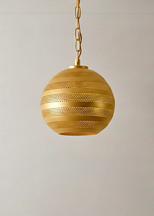 Authentic 100% brass Moroccan pendant lamp with hand-carved perforations and a gold finish, isolated on a light background.