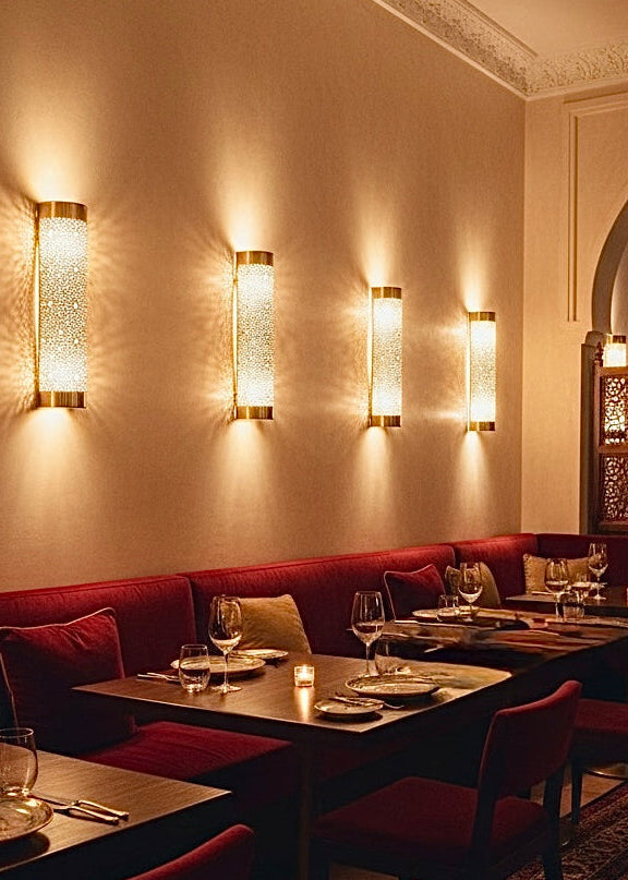 Unique handmade brass wall sconce for boho and oriental interior design.