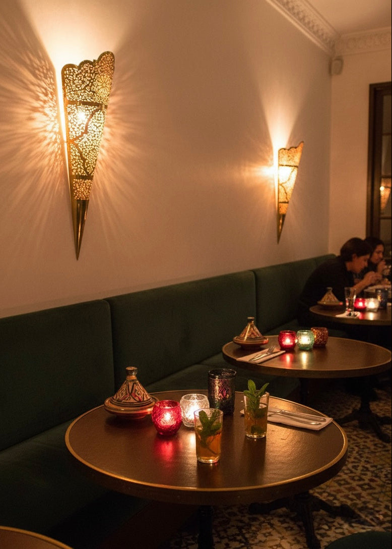 Authentic Moroccan lighting installed in a modern boho-style living room for a cozy atmosphere.