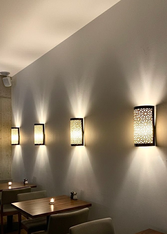 Traditional handmade brass wall sconce perfect for luxury hotel or spa interior design.