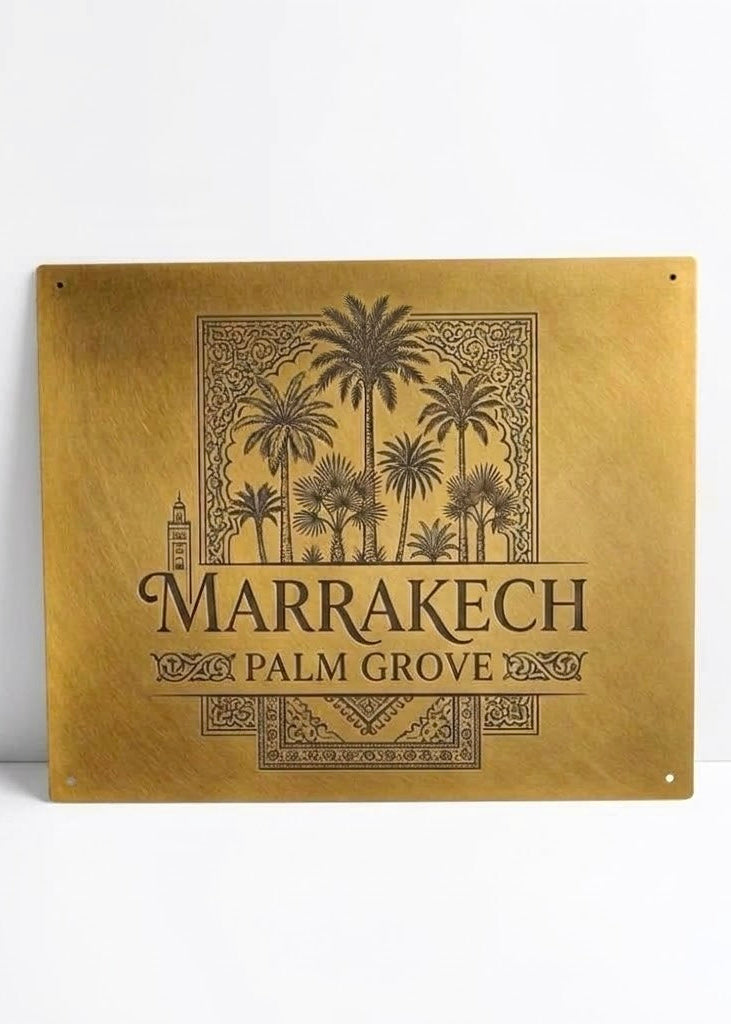 Custom solid brass sign with engraved logo and palm tree motif for business signage and studio nameplates.⁠