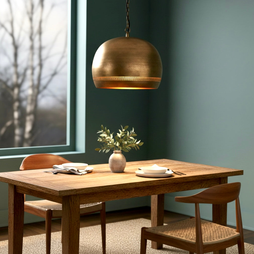 Detailed view of the decorative cutout rim on a brass dome light.