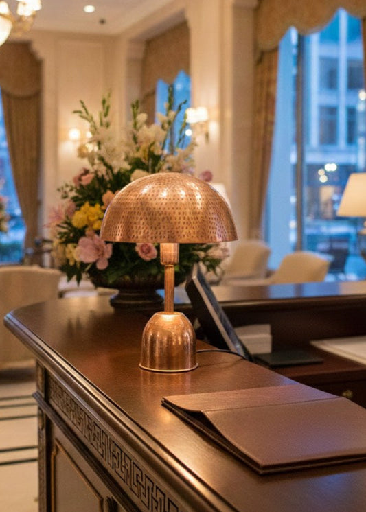 Close-up of hammered copper table lamp with warm light texture