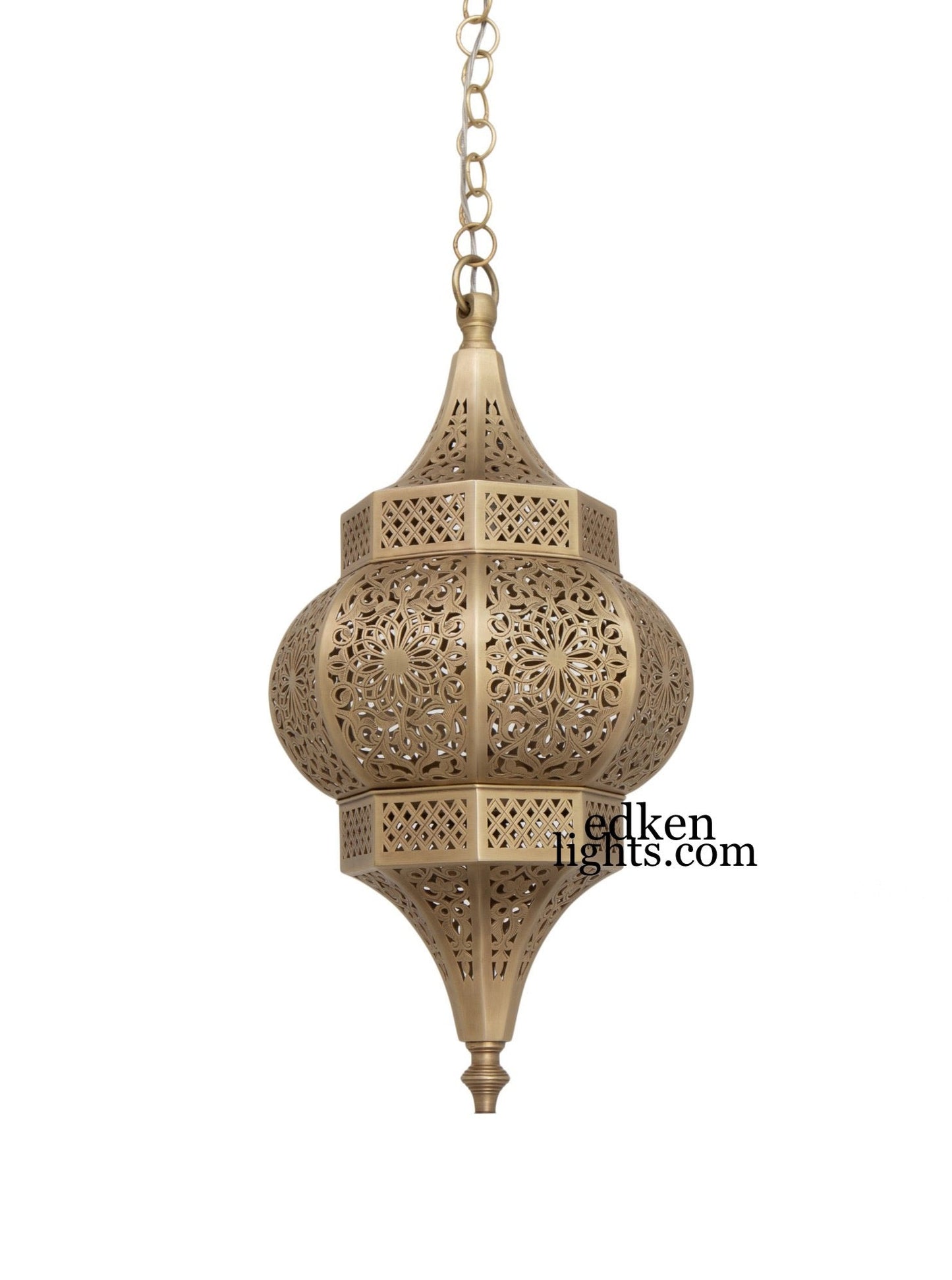 Detail of hand-etched floral designs on a Moroccan brass hanging lantern.