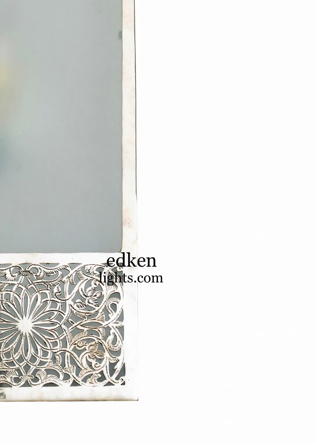 Extreme close-up of handcrafted brass wall sconce detailing, showcasing traditional Moroccan artisan metalwork.