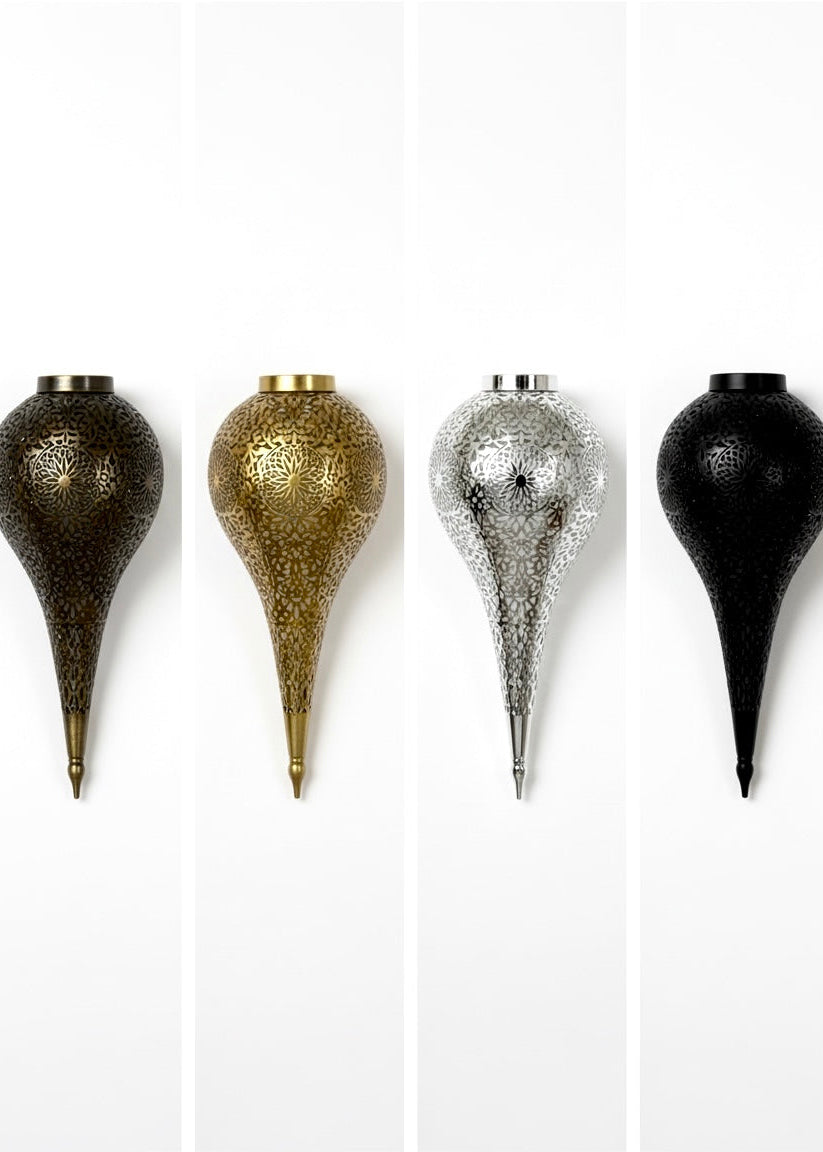Set of four handmade brass wall sconces in gold, silver, black, and antique brass finishes