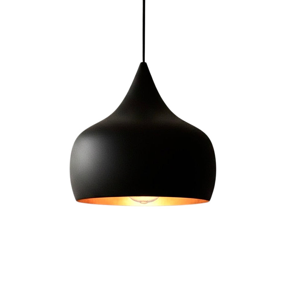 Minimalist handmade brass dome pendant light with matte black exterior and brushed gold interior.