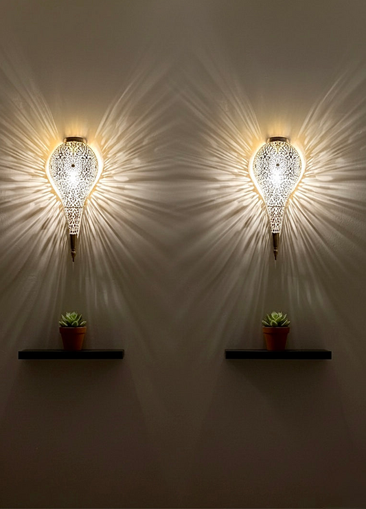 Stunning light shadow effect from a luxury handmade brass wall lamp.