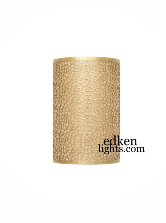 Beautiful geometric shadows cast by a Moroccan brass wall light.