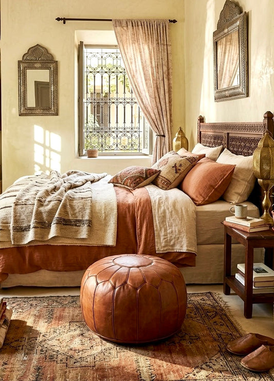 Honey brown genuine leather Moroccan pouf styled in a modern bohemian living room setup
