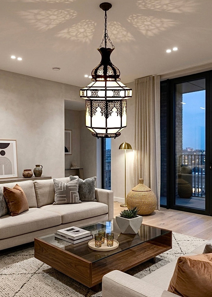 Handcrafted Moroccan glass pendant light installed in a modern living room interior.