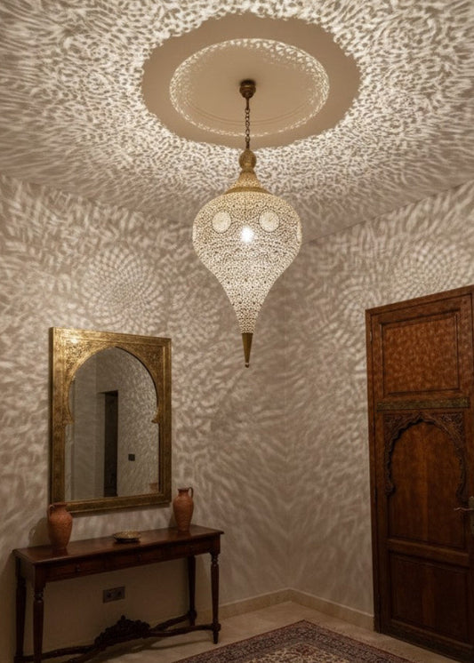 Luxury Moroccan brass pendant light, artisan-crafted for high-end interior design projects globally.