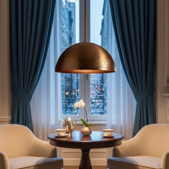 Sleek side profile of a minimalist handmade copper dome ceiling light