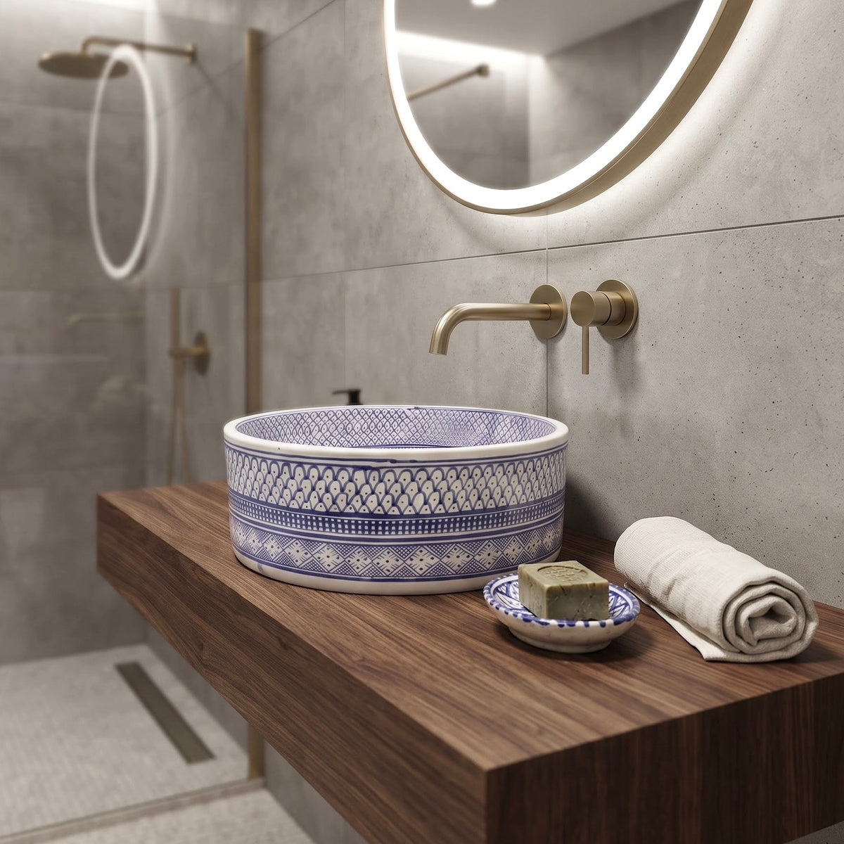 Contemporary bathroom interior featuring a wooden floating vanity paired with a traditional Moroccan blue ceramic countertop washbasin.