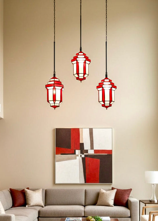 Set of three Moroccan geometric glass lamps in a minimalist high-ceiling living room, contemporary Middle Eastern home decor.