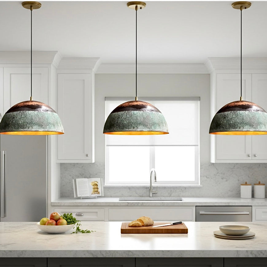 Set of 3 modern patina verdigris copper dome pendants for a white luxury kitchen.