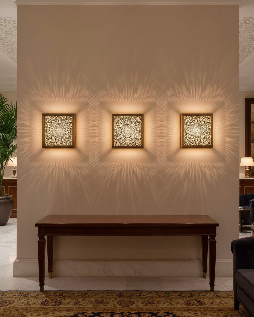 Handcrafted Moroccan brass wall lamp with intricate geometric filigree patterns and warm ambient lighting.