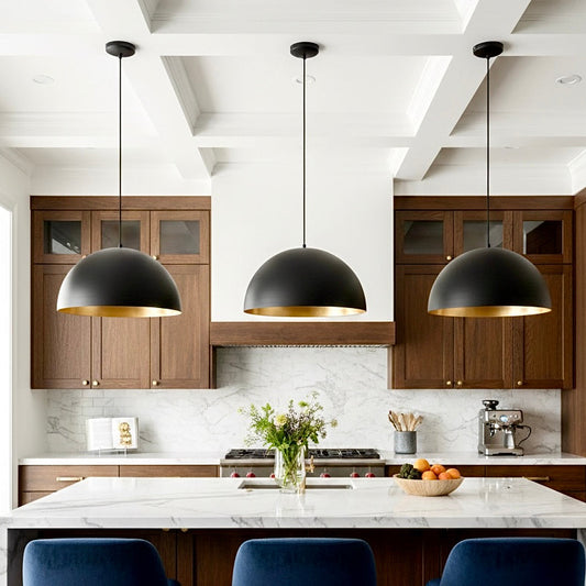 Set of 3 modern pendant lights with a matte black exterior and luxury gold brass interior.