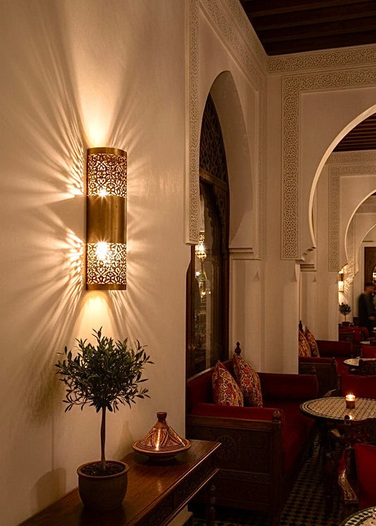 Artisan silver-finished Moroccan wall light, hand-engraved brass sconce for luxury interiors.