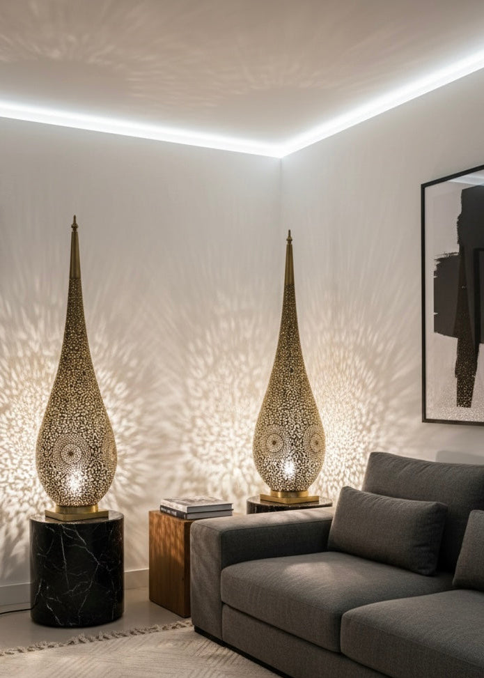 Elegant teardrop-shaped Moroccan brass lantern for luxury home decor.