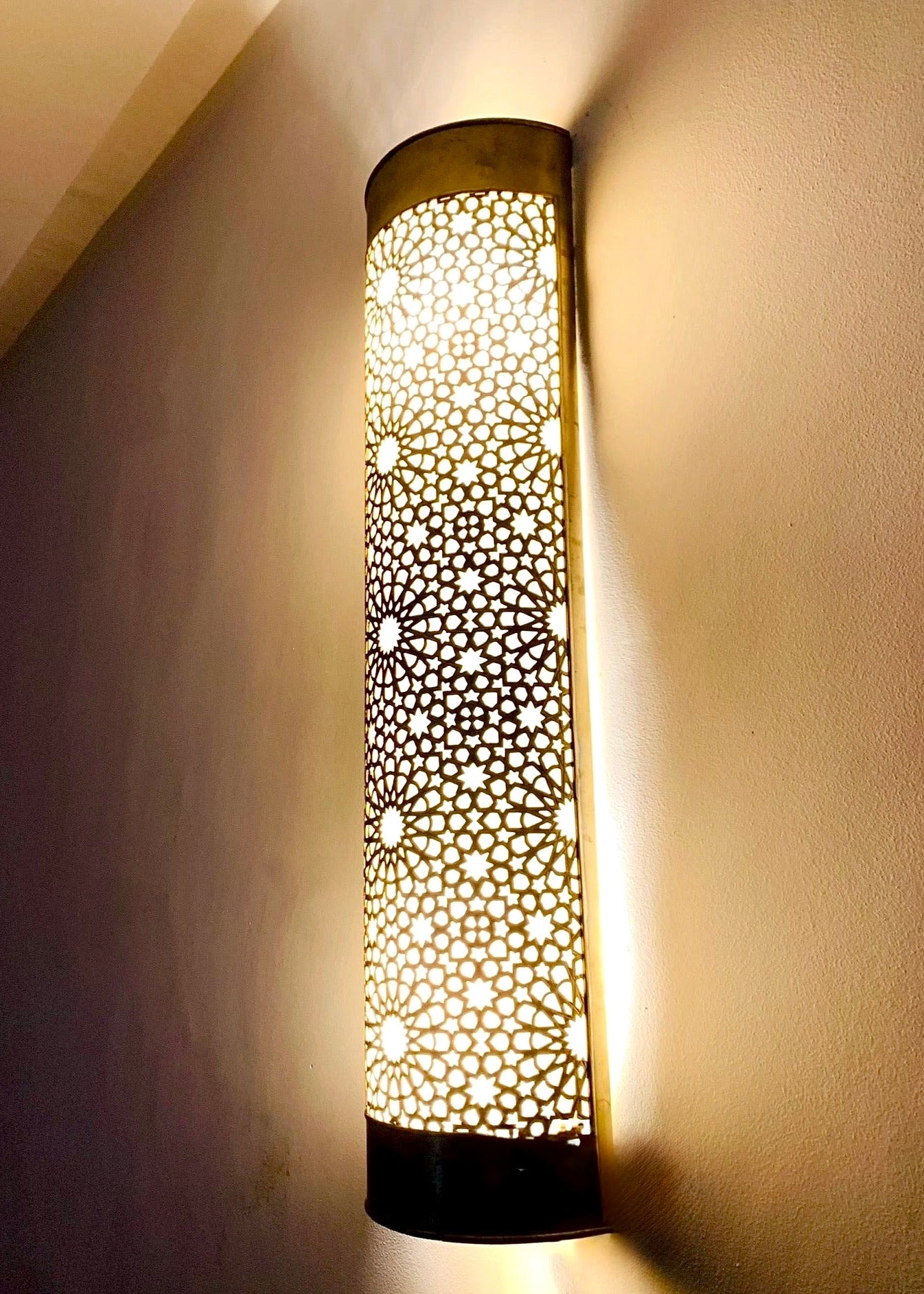 Close-up of Moroccan brass lamp craftsmanship, 100% solid brass.