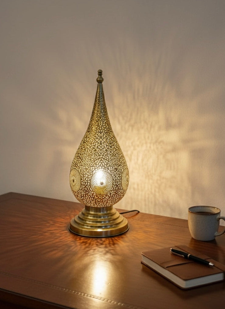 Vintage style Moroccan brass lamp suitable for luxury bedside or living room decor.