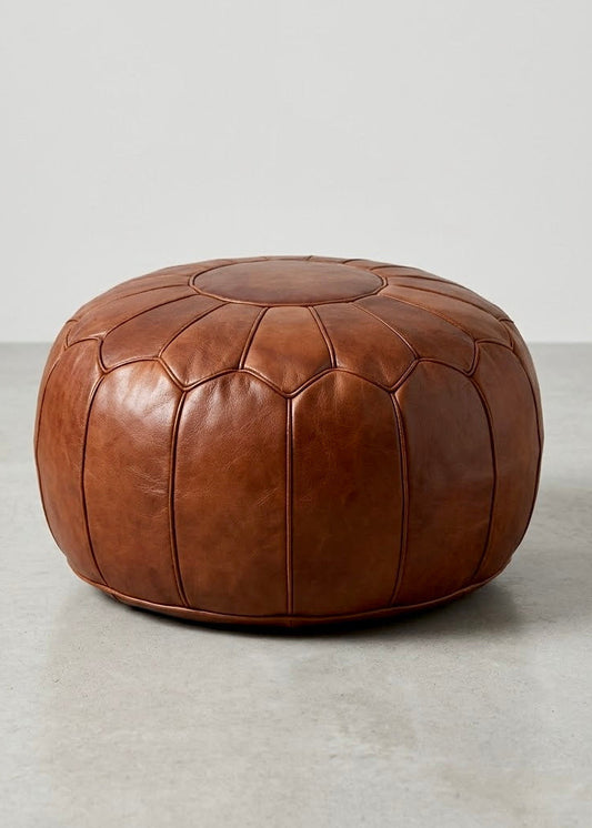 Round honey brown Moroccan leather pouf ottoman handcrafted for wholesale and global retail export