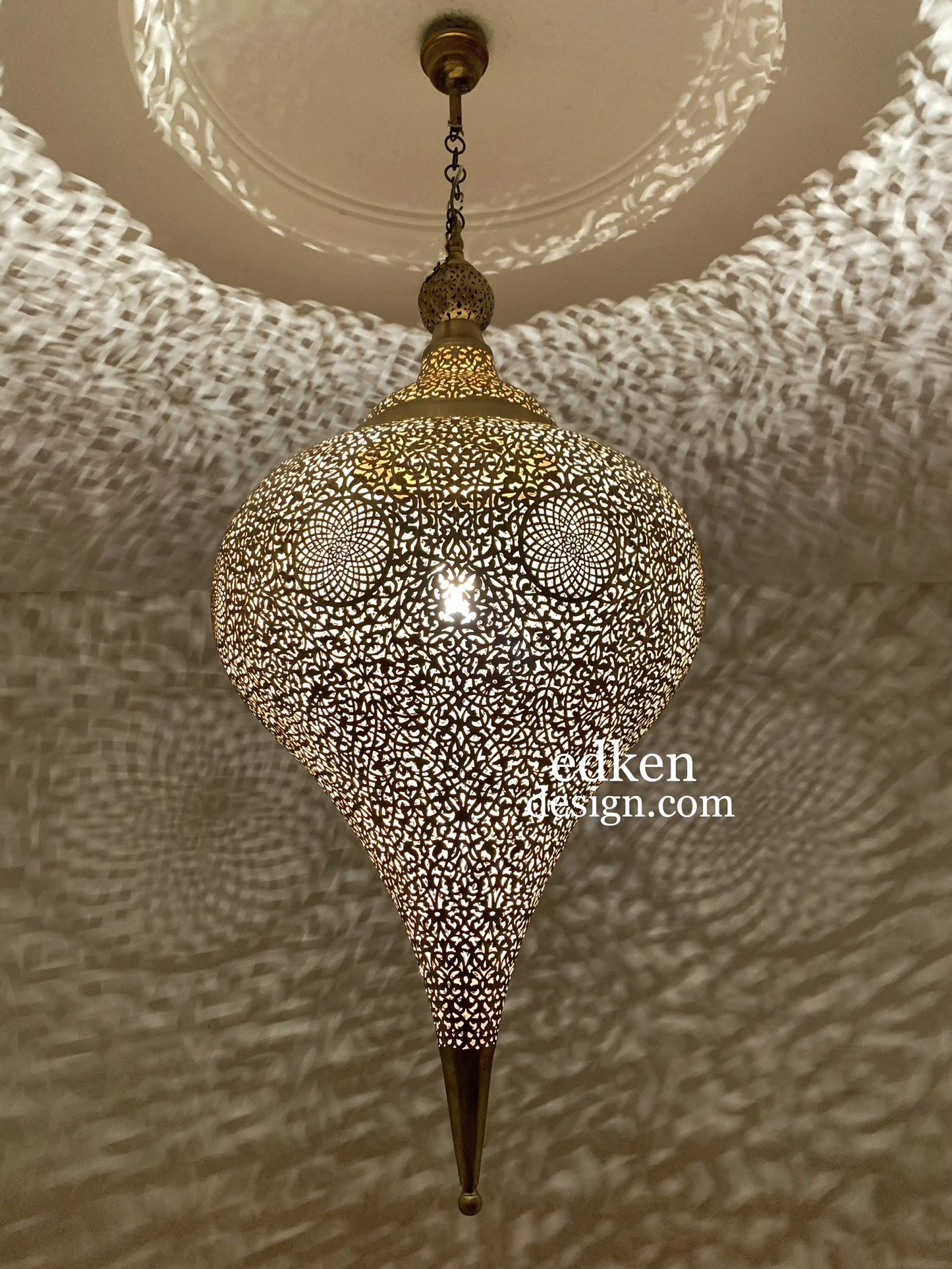 Authentic handmade Moroccan ceiling lamp in brass, available for worldwide shipping and wholesale orders.