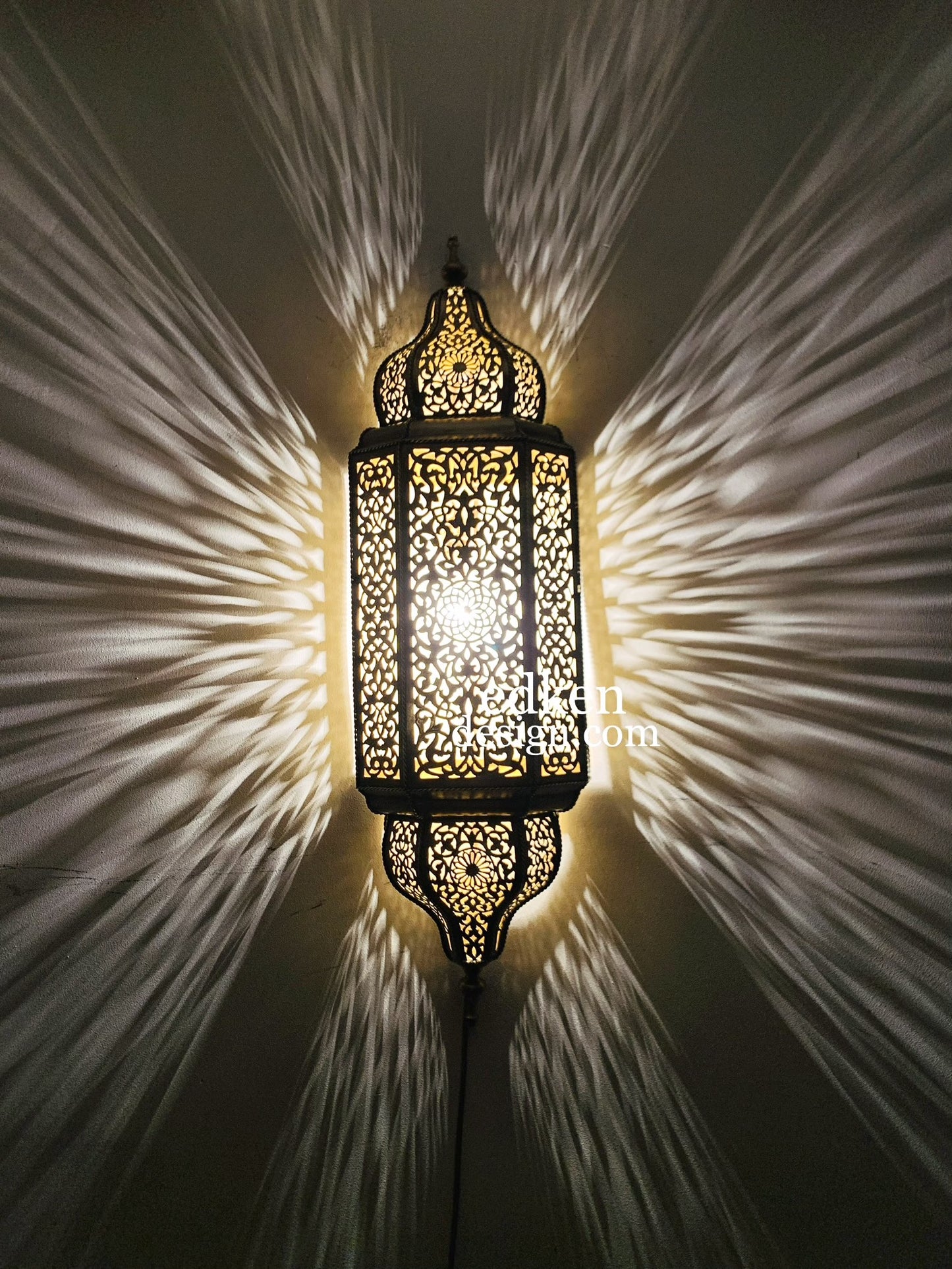 Large Moroccan wall light fixture in polished brass, ideal for luxury interior design and ambient lighting.